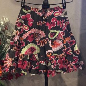 Child’s brown skirt with beautiful flowers size L